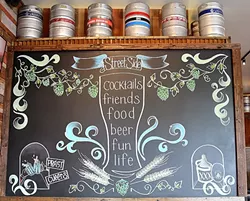 ALL ABOUT THE BEER: A tap of 25 craft beers, including eight rotating and two changing sours, means that there’s always a cool new brew to discover at Street Side Ale House. - PHOTO BY DYLAN HONEA-BAUMANN