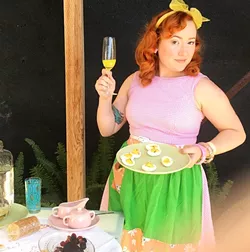 BUT FIRST, CHAMPAGNE : BUT FIRST, CHAMPAGNE A good host always has a few extra bottles of bubbly on hand. New Times Flavor writer Hayley Thomas fills the role with gusto. - PHOTO BY DR. CAIN, ESQ.