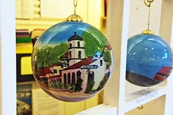 DECK THE HALLS: SLO-centric gifts, like this Motel Inn ornament, are a hit with my out-of-town family members. - PHOTO BY CHRIS MCGUINNESS