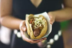 HOT DOG!: During a recent happening at Sally Loo’s, organic artisanal chili dogs collided with Americana music and cold craft beer. - PHOTO BY JEN MANUELE