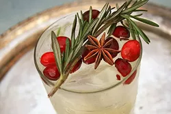 NEW RULE: WINTER MULE: Root Elixirs’ ginger soda mixed with ice, vodka, and a few holiday worthy accouterments are all you need to wow at your next holiday soiree. You can also get one made to order at the bar at Granada Hotel and Bistro in downtown SLO. - PHOTO BY HAYLEY THOMAS CAIN