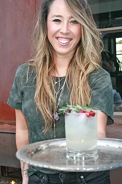 FRIENDS DON’T LET FRIENDS DRINK BLAH: Root Elixirs owner Dominique Gonzales was fed up with how intimidated her friends felt about creating their own craft creations. So, she made it super easy to DIY a sophisticated sip. - PHOTO BY HAYLEY THOMAS CAIN