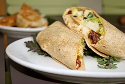 HAIL CAESAR!: Full of crunchy lettuce and tender chicken, this Caesar wrap is a fresh choice for a quick lunch bite. - PHOTO BY HAYLEY THOMAS CAIN