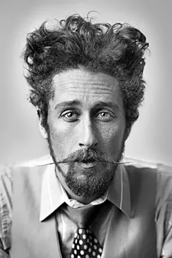 ONE MAN WRECKING CREW: Witness the raw blues of The Suitcase Junket (aka Matt Lorenz) on Sept. 30 at Bang the Drum. - PHOTO COURTESY OF THE SUITCASE JUNKET