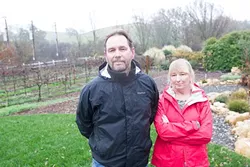 WELL WORRIES: Steve and Leslie Reilly, residents of Roblar west of Templeton, joined their neighbors in protesting plans for an agricultural pond and vineyard nearby. They argued that the pond posed a threat to their water supply. - PHOTO BY JAYSON MELLOM