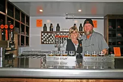 JUMP IN, BEER’S FINE: In 2015, San Diego residents and Silva Brewing Co. owners Chuck and Mary Jo Silva jumped head first into the idea of starting a new life on the Central Coast. First came wedding bells, then a big move, and then an even bigger dream: to brew their own beer together. - PHOTO BY HAYLEY THOMAS CAIN