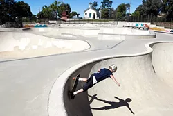 NEW DIGS : Dorian Brzykey, 10, shreds on a Sunday afternoon at the Los Osos Skate Park, which received more than $1 million in public facility fees funding. Nipomo skateboarders, who don’t have access to a nearby skate park, sometimes ride the bus up to skate parks in Los Osos and San Luis Obispo, but it takes about an hour and a half. - PHOTO BY JAYSON MELLOM