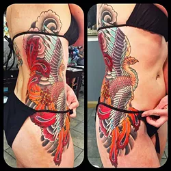 SUN’S OUT, TATTOOS OUT: This colorful bird tattoo by Gary Ellsworth on a client’s side can easily be covered up for work and at the pool. - PHOTO COURTESY OF GARY ELLSWORTH