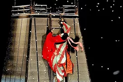 SEAMLESS CONTROL: Three puppeteers steer one doll in Bunraku performances, working together to make each puppet move in detailed lifelike ways. The head puppet master is in control of the body, head, and right arm; one is in control of the legs or kimono (depending on whether the doll is male or female) and one controls the left arm. - PHOTO COURTESY OF SLOMA