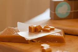 HIGH FIVE YOUR DENTIST : Some stick-to-your-teeth caramels are impossible to get down. Creamy, soft, buttery, chewy, and delicious, locally made Sugar + Spoon caramels are from a different planet entirely. - PHOTO COURTESY OF SUGAR + SPOON