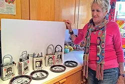 NOT MY CUP OF TEA: Australian Artist Jan Dungan shows off her “despots” at her home in Arroyo Grande. Each ceramic teapot features a depiction of figures like Donald Trump, Fidel Castro, and Adolph Hitler. - PHOTO BY RYAH COOLEY