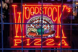 PITCHER AND A BEER : Woodstock’s in SLO will soon be home to a new seating and event area decked out to look like the “coolest backyard you’ve ever stepped foot in,” according to co-owner Laura Abrose. - PHOTO COURTESY OF WOODSTOCKS PIZZA
