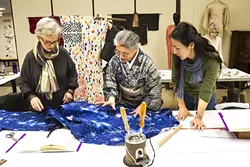PASSING DOWN KNOWLEDGE: Karen Morgan, from SLO, left, and Mio Yamashita, right, from Menlo Park, learn the tricks of kimono making from Tsuyo Onodera, center, at SLOMA. - PHOTO BY JAYSON MELLOM