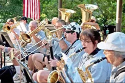 JAMMIN’ FOR A CAUSE : Members of the Atascadero Community Band perform at a benefit barbecue at Atascadero Lake. On May 7, the band will perform a benefit concert in support of Project Lifesaver. - PHOTO COURTESY OF ATASCADERO COMMUNITY BAND