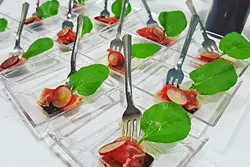 A NEW HEIRLOOM TRADITION: A recent wine pickup party at Alta Colina Winery called for Heirloom Catering’s venison carpaccio with chocolate espresso herb oil, sea salt, and watercress. - PHOTO COURTESY OF HEIRLOOM CATERING