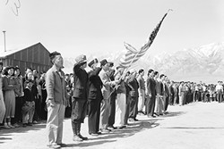 MANZANAR:  Memorial Day services in 1942 at Manzanar, Calif., an interment camp where people of Japanese descent were sent during World War II. - PHOTO COURTESY OF THE NATIONAL ARCHIVES AND RECORDS ADMINISTRATION