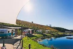 PARK IT HERE: The Adelaida District of Paso Robles is home to Alta Colina Vineyard—and now the Tinker Tin Trailer Pond, which features a unique wine country stay surrounded by the winery’s 130 organically farmed acres. - PHOTO COURTESY OF TINKER TIN