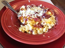 LINN&rsquo;S RESTAURANT:  While bacon and bell peppers were a pretty touch, the four cheese macaroni at Linn&rsquo;s Restaurant didn&rsquo;t stay hot or cohesive for too long. - PHOTO BY RYAH COOLEY