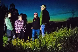 SENSITIVE HABITAT : Mary Ciesinski, executive director of ECOSLO; Carolyn Huddleston, ECOSLO docent; Heidi Harmon, SLO mayor; and Evan Albright, docent, (left to right) discuss the issue of night hiking at Laguna Lake Park. - PHOTO BY JAYSON MELLOM