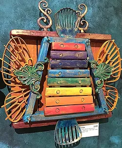 GET IT TOGETHER: A xylophone gets its wings, a racket holder, finials, and more in 'Badminton.' - PHOTO BY TREVER DIAS