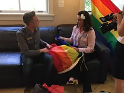 VANDALIZED: SLO Mayor Heidi Harmon talks with Ryan Duclos, president of SLO County’s Gay and Lesbian Alliance, after an unknown vandal set fire to a pride flag outside her home May 31. - PHOTO COURTESY OF ELLEN STURTZ