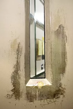 INSIDE LOOKING OUT: Inmates struggling with mental illness could see their conditions worsen as they wait for court-ordered transfers to local or state mental health facilities. - PHOTO BY JAYSON MELLOM