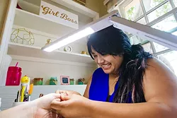 NAIL ARTIST: Pinkies Up owner Yessie Nojas can get those nails looking pretty friggin’ sweet, and our readers believe her skills are the best in SLO County. - PHOTO BY JAYSON MELLOM