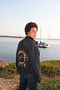 GARDEN, ANARCHY, PEACE Anna Benjamin of Morro Bay joined the Guerrilla Gardening Club in 2015. She wears a jacket she emblazoned with the nonprofit's edgy logo, which stands for "garden, anarchy, peace." - PHOTO BY HAYLEY THOMAS CAIN