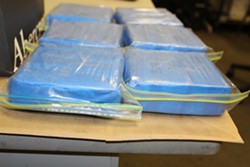 MOVING WEIGHT Law enforcement recovered an estimated 3 kilograms of cocaine during a July 2015 traffic stop of one of the drug ring's drivers. - PHOTO COURTESY OF SLO COUNTY SHERIFF'S OFFICE