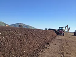 LOCALLY MADE Cal Poly compost is made by students—by the campus, for the campus. It’s sold locally and supplies campus landscaping services and the organic farm. - PHOTO COURTESY OF CAL POLY AG OPERATIONS DEPARTMENT