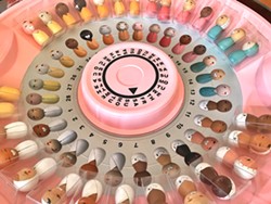 CHOICE? Control by Lena Rushing imitates a container of women's birth control pills, but is filled with baby dolls instead (they can be purchased individually). - IMAGE COURTESY OF LENA RUSHING