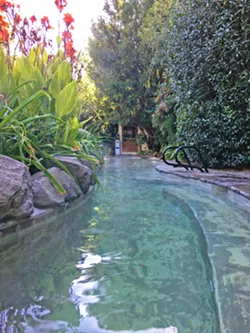 GO SOAK YOUR HEAD The Soaking Pool near Ruby's Spa offers plenty of private nooks and crannies to enjoy a private 103-degree soak. - PHOTOS BY GLEN STARKEY