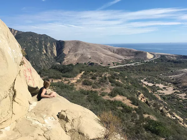 OCEAN FOR DAYS Highway 101 and the Pacific Ocean make for a pretty sweet sight from the wind caves above Gaviota State Park. - PHOTO BY CAMILLIA LANHAM