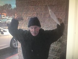 PESKY PETITIONERS Albertson's says that several unarmed individuals, including the man above, are violating the company's solicitation policies and seeking signatures for petitioning outside their Paso Robles, creating a nuisance for customers. - PHOTO FROM COURT DOCUMENTS