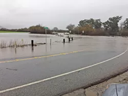 SETTLED Three SLO residential groups settled a lawsuit with the city and the Avila Ranch developer over concerns about the project's impacts, like traffic safety on Buckley Road when it floods at Vachell Lane. - PHOTO COURTESY OF JIM WALDSMITH