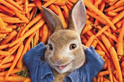 SILLY RABBIT Tensions build between Peter (voiced by James Corden) and Mr. McGregor (Domhnall Gleeson) as they rival for the affections of Bea (Rose Byrne) in Peter Rabbit. - PHOTO COURTESY OF COLUMBIA PICTURES