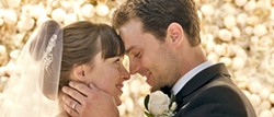 HAPPILY EVER AFTER? In Fifty Shades Freed, newly weds Christian (Jamie Dornan) and Ana (Dakota Johnson) try and adjust to their new life while dealing with threats to their happiness. - PHOTO COURTESY OF UNIVERSAL PICTURES