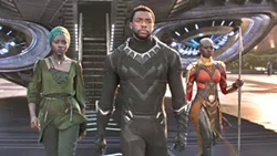 HERO In Black Panther, T'Challa's (Chadwick Boseman, center) resolve as king and superhero Black Panther is tested when he is drawn into a conflict that puts the fate of his country and the world at risk. - PHOTO COURTESY OF MARVEL STUDIOS