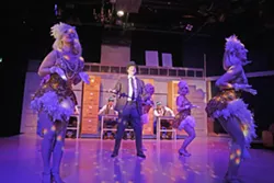 DREAM BIG, KID Emboldened by his dreams of becoming a Broadway producer, Leo Bloom (Toby Tropper, center) finally leaves his miserable accounting job and tyrannical boss behind. - PHOTO COURTESY OF RYLO MEDIA DESIGN