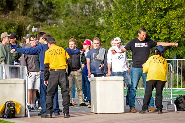 CAMPUS DIVIDED Aside from the line of event attendees, Milo Yiannopoulos' second visit to Cal Poly was quiet. - PHOTO BY JAYSON MELLOM