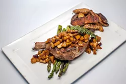 THEY HAVE THE MEATS Steak is a big deal at ON Bar in Paso Robles. Order a filet mignon, 14-ounce rib-eye, 12-ounce New York strip, slow smoked prime rib, or 8-ounce top sirloin. Of course, you could get 14-ounce thick-cut pork chops, smoked cornish game hen, a sirloin burger, or baby back ribs, if you're still feeling peckish. - PHOTO COURTESY OF BY MELISSA MATTSON