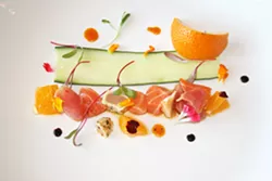 FREESTYLE At Arigato, ahi and salmon sashimi mingle with zesty citrus and a dose of herbaceous Spring greens. - PHOTO BY HAYLEY THOMAS CAIN