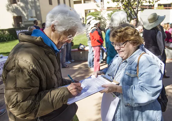FIGHT FOR TOMORROW Volunteers with the Coalition to Protect SLO County gathered more than 20,000 signatures to qualify Measure G, a ban on fracking and new oil wells, for the November ballot. - PHOTO BY JAYSON MELLOM
