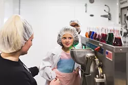 A LITTLE SWEETNESS Make a Wish recipient Maysie creates her own ice cream flavor at Doc Burnstein's Ice Cream Lab. Her creation, "Unicorn Swirl," features strawberries, pie crust, and a white cake batter ice cream. Every scoop sold delivers 25 cents to the foundation. - PHOTO COURTESY OF DOC BURNSTEIN'S
