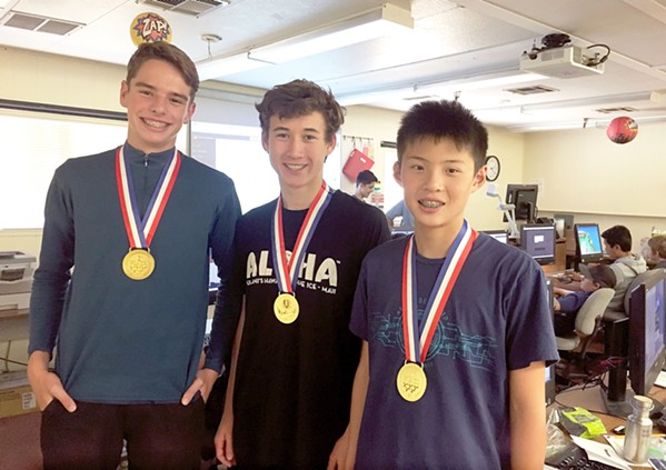 CRACKING CODES Grant Broersma, Christopher Dahl, and Edward Chiang (left to right) won the Cyber Patriot competition at Cuesta College’s summer cyber camp. - PHOTO BY KAREN GARCIA