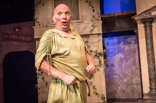 FREE! The crafty Pseudolous (Billy Breed) tries to win his freedom by helping his master get the girl of his dreams in SLO Rep's production of A Funny Thing Happened on the Way to the Forum. - PHOTO COURTESY OF RYLO MEDIA DESIGN