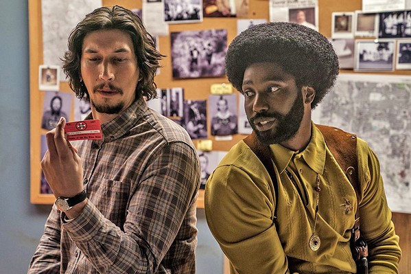 UNDERCOVER BROTHER Flip Zimmerman (Adam Driver, left) and Ron Stallworth (John David Washington) star in auteur Spike Lee's BlackKklansman, about a black police officer and his white counterpart who infiltrate the local KKK chapter. - PHOTO COURTESY OF 40 ACRES &amp; A MULE FILMWORKS