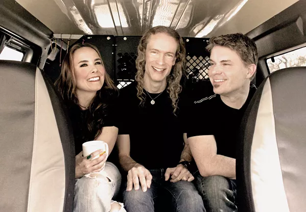 IN THE VAN The Travis Larson Band (Jennifer Young, Larson, and Dale Moon) are hot off a multi-month national tour but back home now with a show at Sweet Springs Saloon on Sept. 1. - PHOTO COURTESY OF THE TRAVIS LARSON BAND