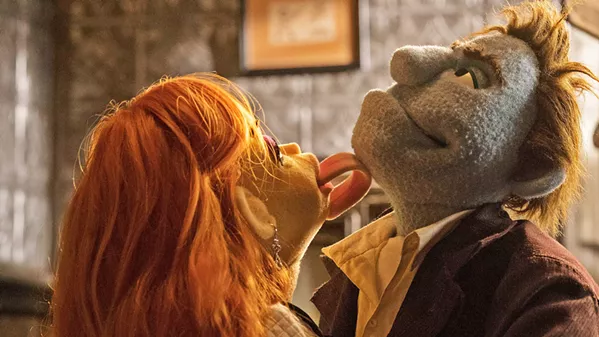 PUPPET SLEAZE Sandra White (voiced by Dorien Davies) butters-up private dick Phil Philips (voiced by Bill Barretta), in the lowbrow Muppet satire The Happytime Murders. - PHOTO COURTESY OF FOCUS FEATURES