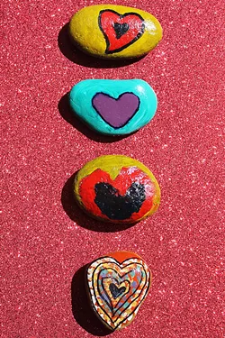 ROCKS OF EMPOWERMENT Therapeutic art is one way that Stand Strong tries to help victims of intimate partner violence—children and adults—sort through the trauma they've experienced. - PHOTO COURTESY OF STAND STRONG